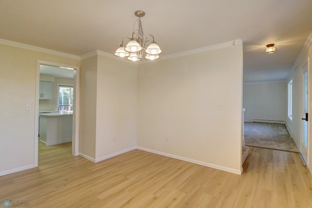 spare room featuring ornamental molding, a baseboard heating unit, light hardwood / wood-style flooring, and a notable chandelier