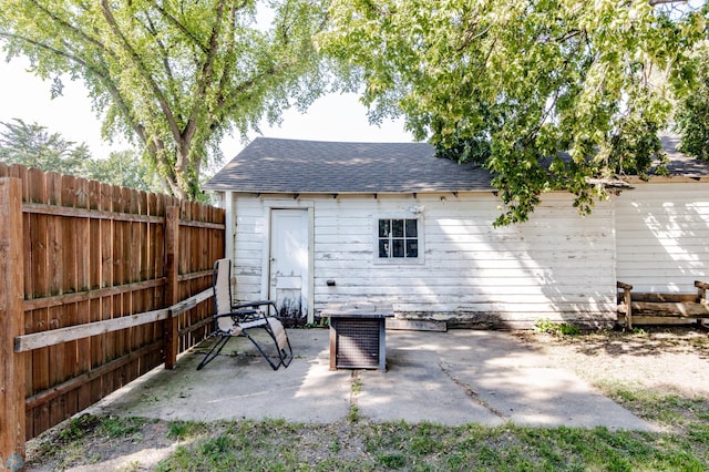 rear view of house with a patio