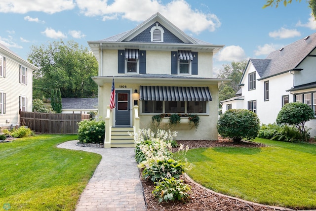 view of front of home featuring a front yard