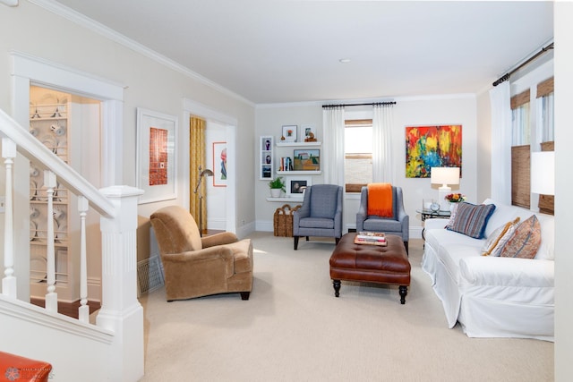 living room featuring ornamental molding and carpet