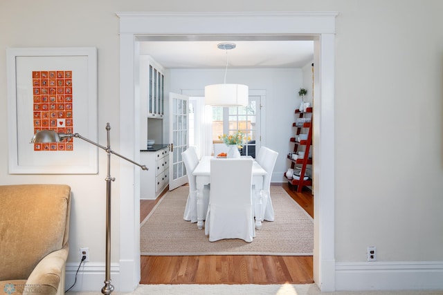 dining area with light wood-type flooring