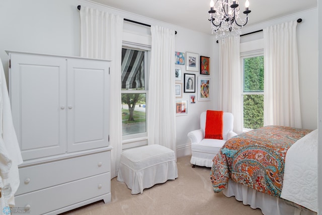 bedroom featuring multiple windows, an inviting chandelier, light carpet, and ornamental molding