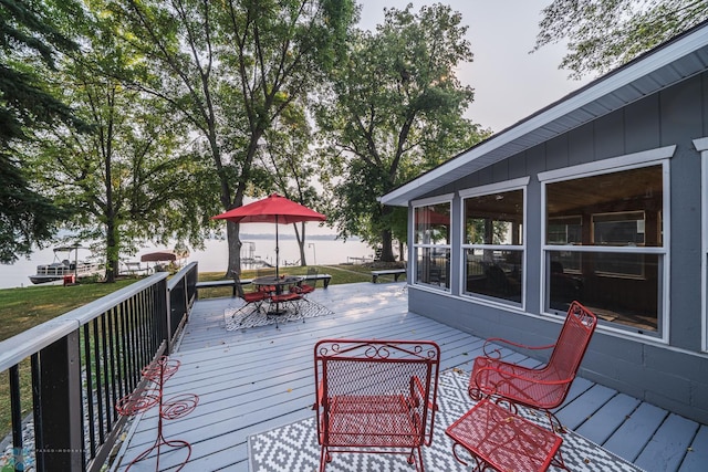 wooden terrace with a sunroom