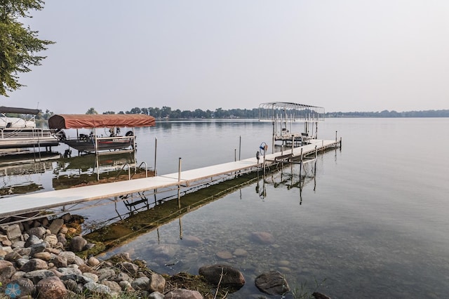 dock area with a water view