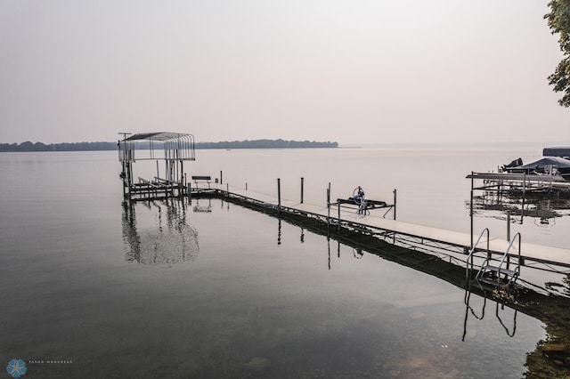 view of dock with a water view