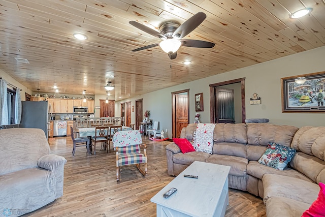 living room featuring light wood-type flooring, ceiling fan, and wooden ceiling