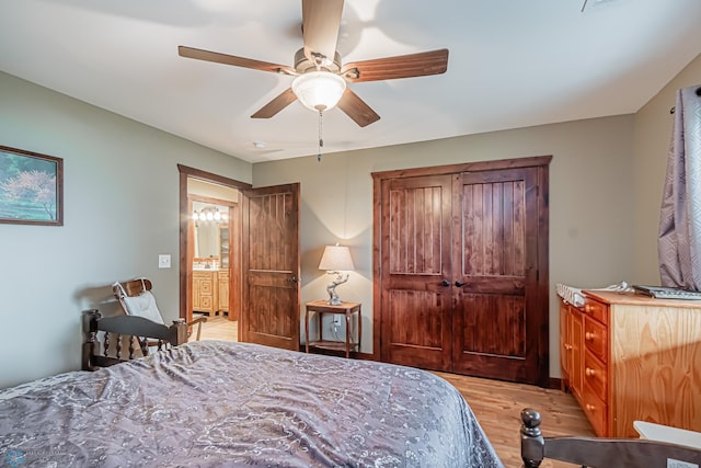 bedroom featuring light hardwood / wood-style flooring and ceiling fan