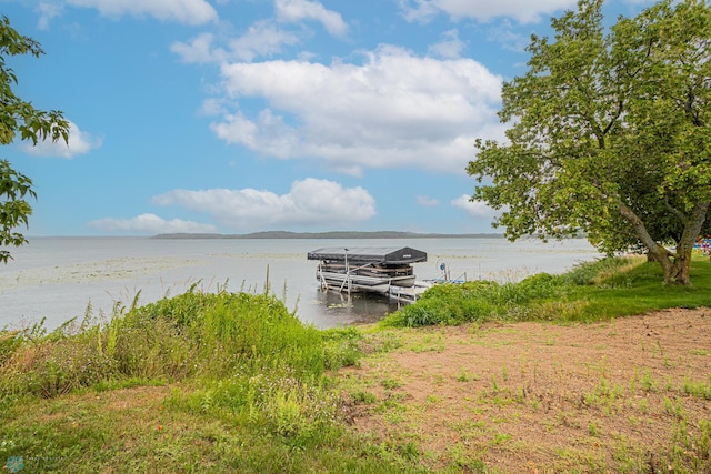 dock area featuring a water view