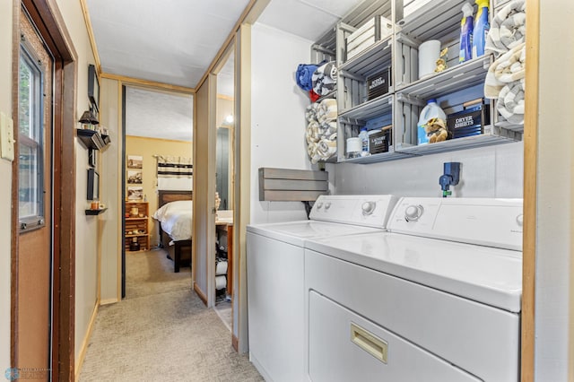 laundry area featuring washing machine and dryer