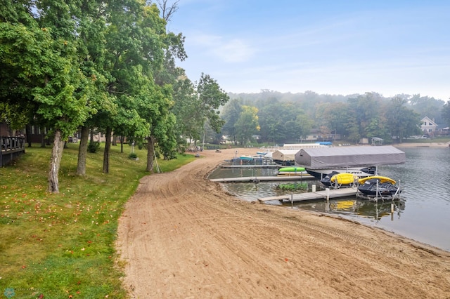 dock area with a water view