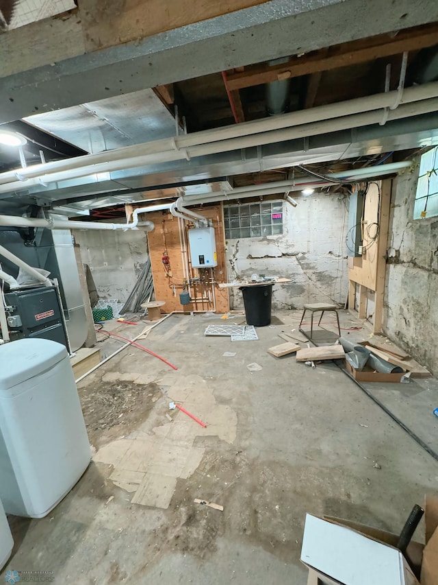 basement featuring water heater