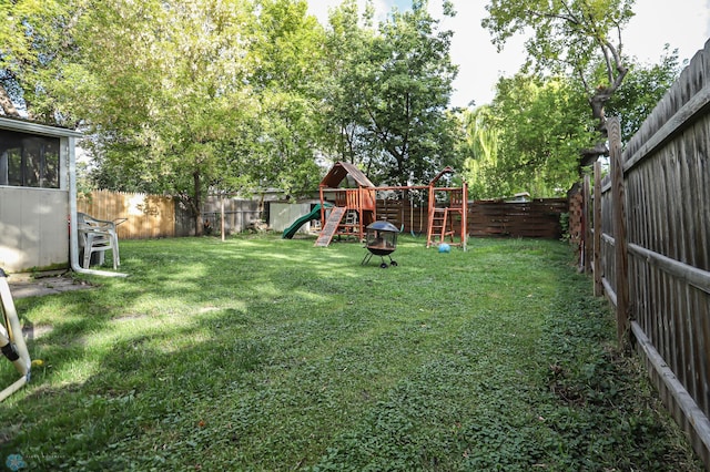 view of yard featuring a playground