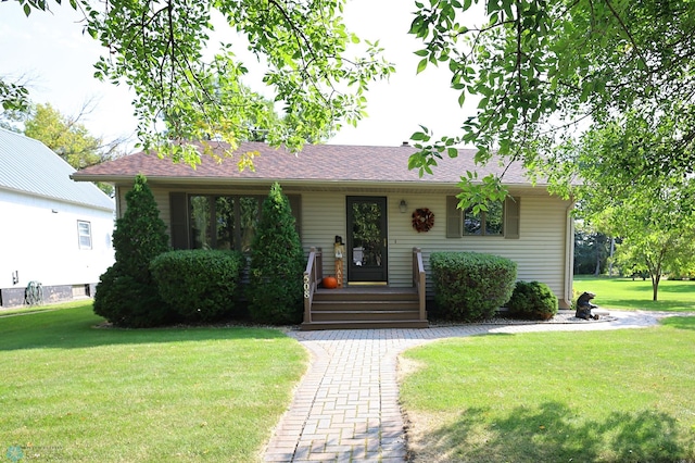 view of front of house featuring a front yard and a porch