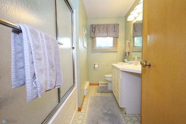 full bathroom featuring shower / bath combination with glass door, vanity, toilet, and a baseboard radiator