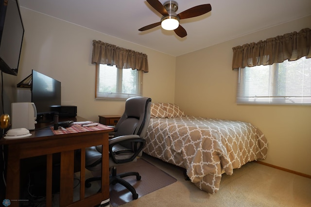 bedroom featuring ceiling fan and carpet flooring