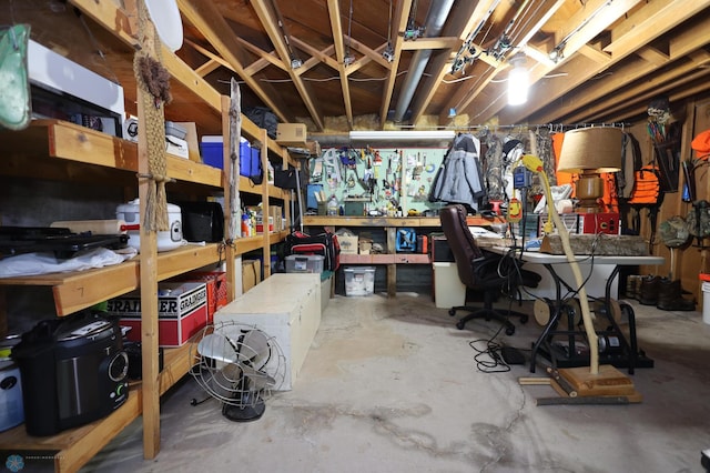 basement with a workshop area