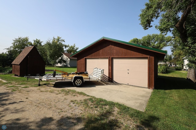 garage featuring a yard