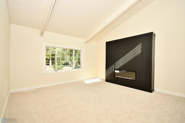 interior space with lofted ceiling with beams and wooden ceiling