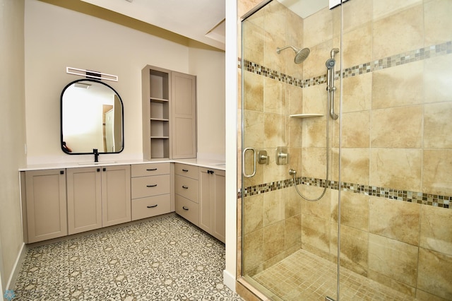 bathroom featuring vanity and a shower with shower door