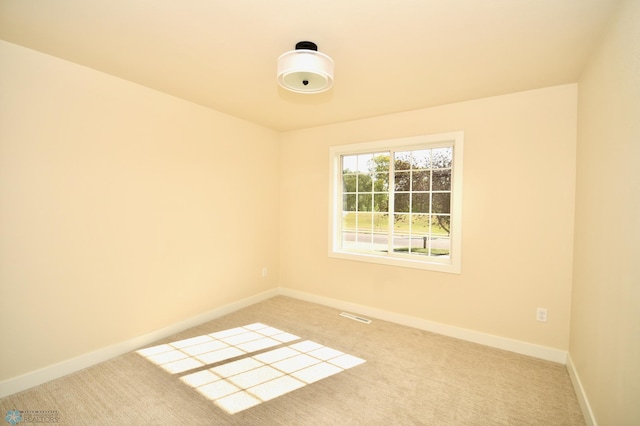 view of carpeted spare room