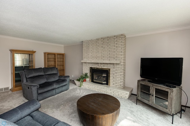 carpeted living room with a textured ceiling, ornamental molding, and a fireplace