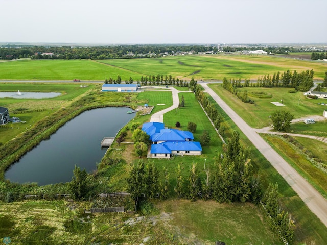 aerial view featuring a rural view and a water view