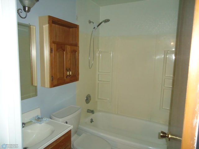 full bathroom featuring vanity, shower / bath combination, and toilet