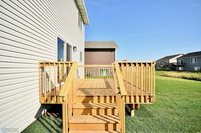 deck featuring a lawn