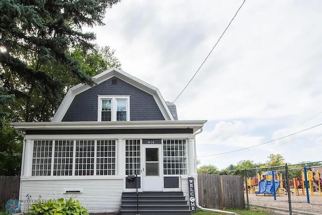 view of front of home featuring a playground