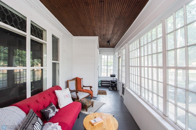 sunroom / solarium with wooden ceiling