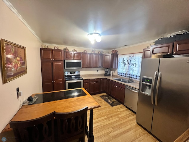 kitchen featuring stainless steel appliances, light hardwood / wood-style flooring, dark brown cabinetry, ornamental molding, and sink