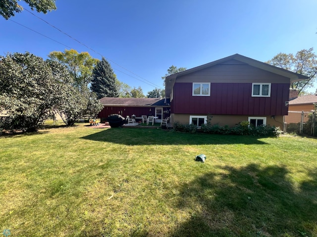 exterior space featuring a yard and a patio area