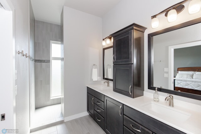 bathroom with vanity and tile patterned floors