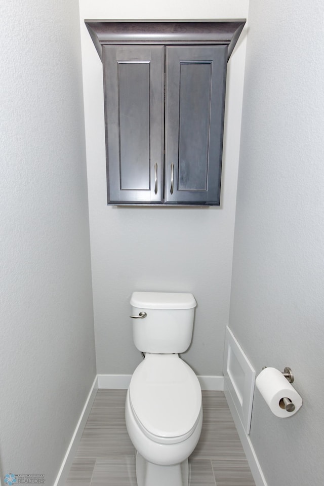 bathroom featuring toilet