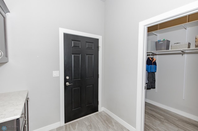 entrance foyer with light hardwood / wood-style floors