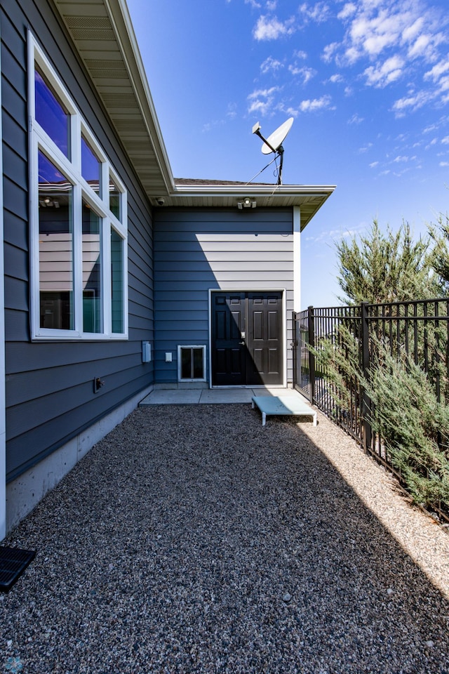 entrance to property with a patio area