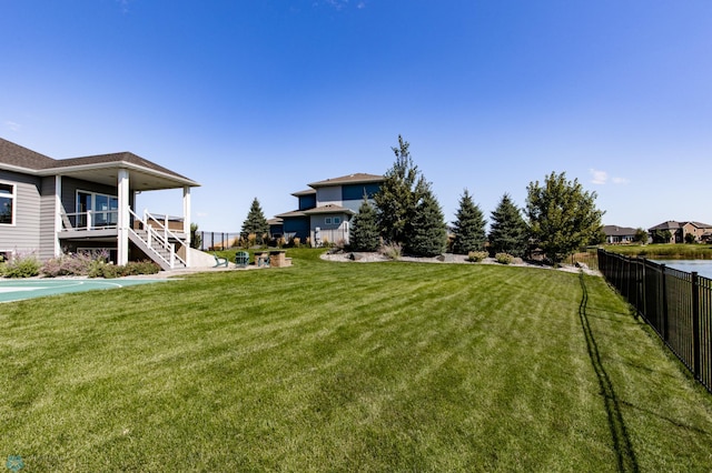 view of yard featuring a wooden deck