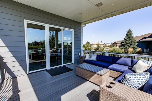 wooden deck featuring an outdoor hangout area