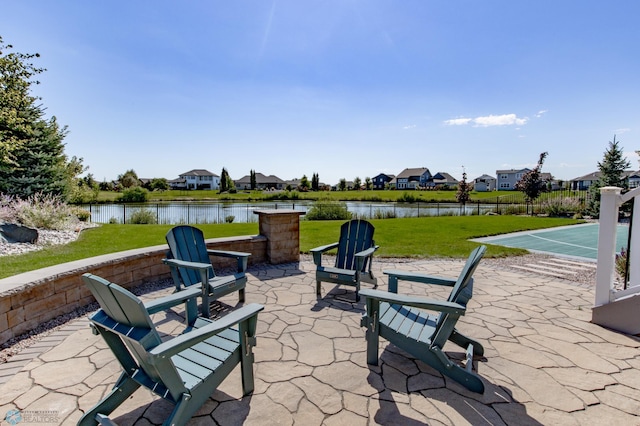 view of patio / terrace featuring a water view