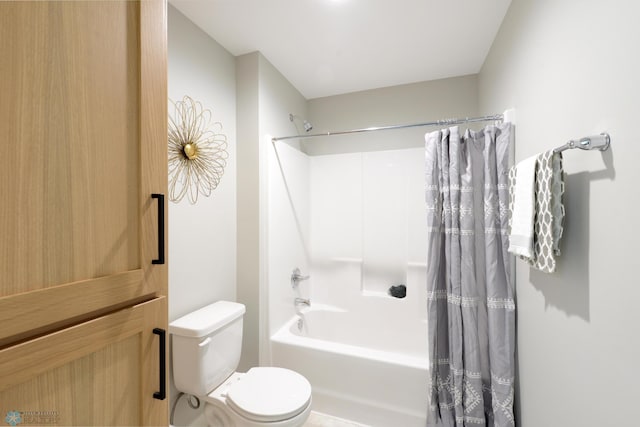 bathroom with toilet and shower / bathtub combination with curtain