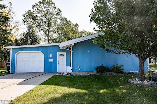 single story home with a front lawn and a garage