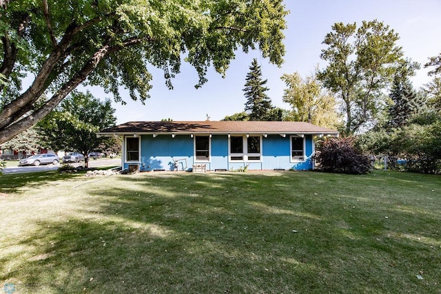 ranch-style house with a front yard