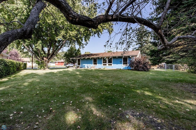 exterior space featuring a lawn