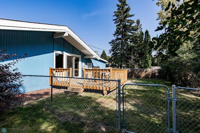 view of yard featuring a wooden deck