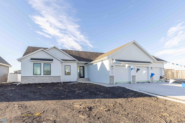 ranch-style home with a garage