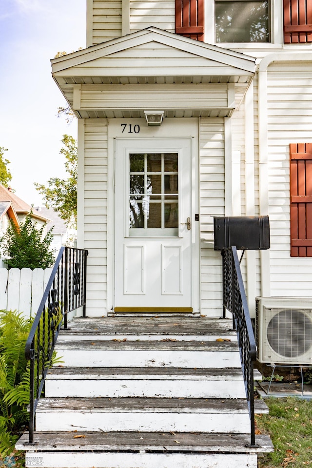 property entrance featuring ac unit