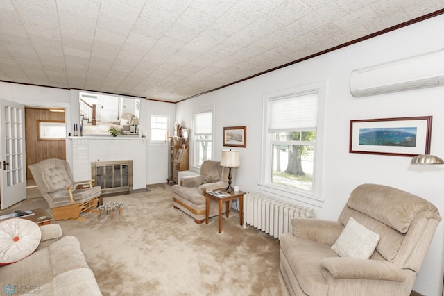 living room with light carpet, a wealth of natural light, radiator, and a fireplace