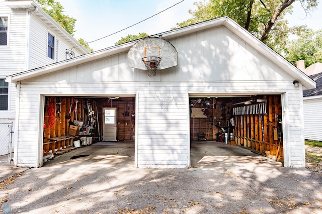 view of front of house with an outdoor structure and a garage