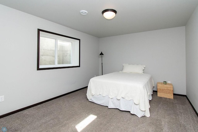 bedroom featuring carpet