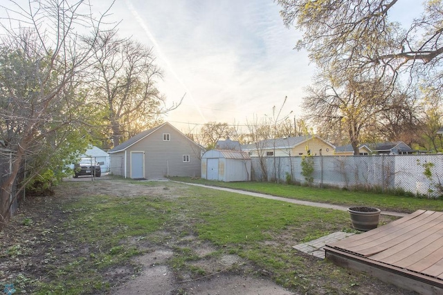 view of yard with a storage shed